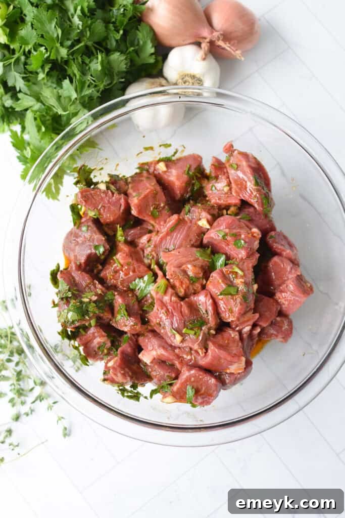 Mediterranean Steak Bites marinade on beef in bowl 