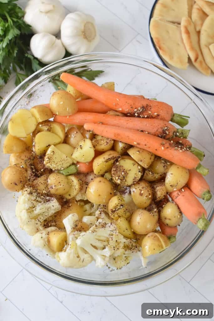 Sheet Pan Za’atar Chicken potatoes and veggies in bowl