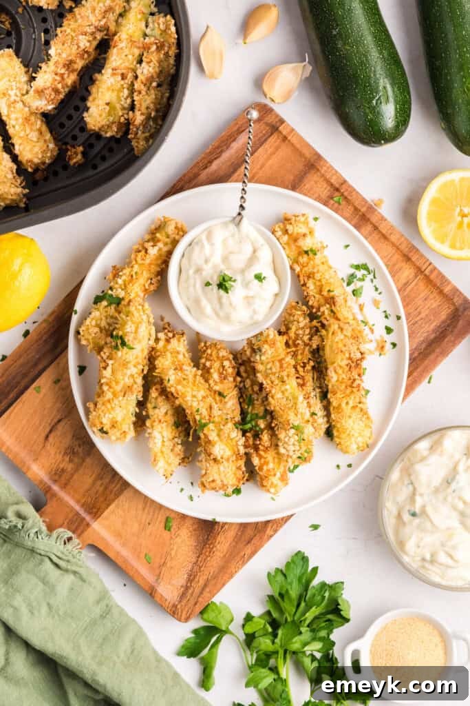 Crispy Air Fryer Zucchini Fries 8 A basket full of perfectly air-fried zucchini fries, ready to be served.