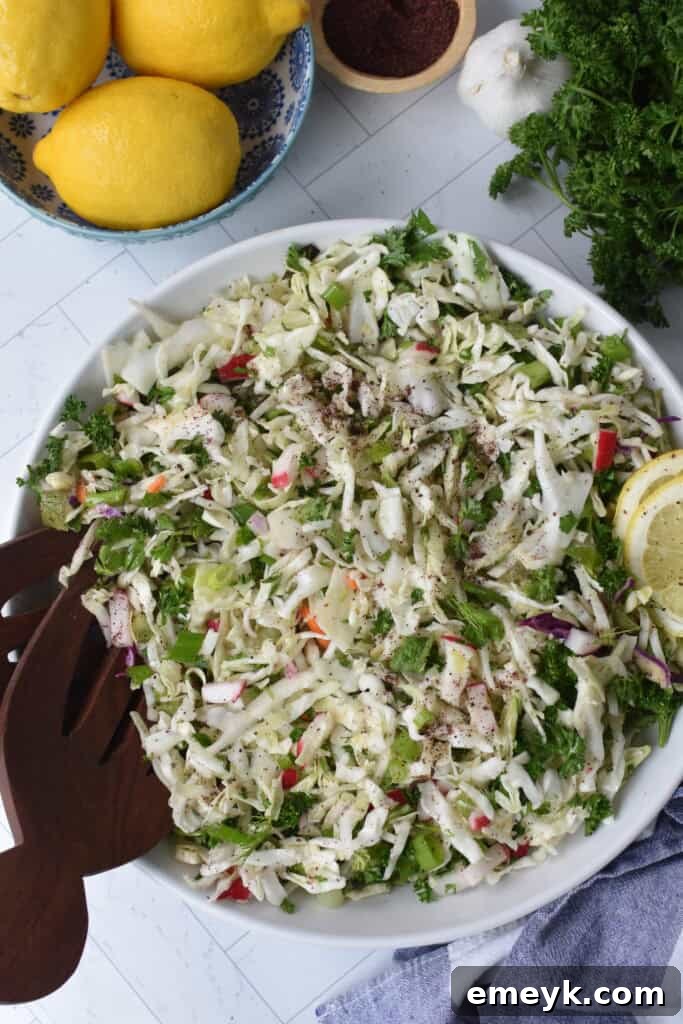 Malfouf Salad in a white bowl with fork