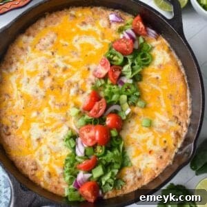 Beefed-Up Cottage Cheese Queso 10 Cottage Cheese Queso in a skillet with garnishes