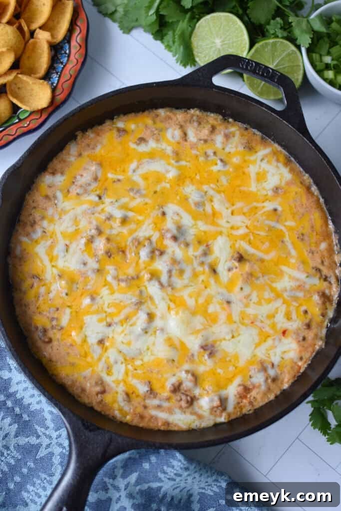 Beefed-Up Cottage Cheese Queso 8 Ground beef and cheese melted in a black cast iron skillet after baking.