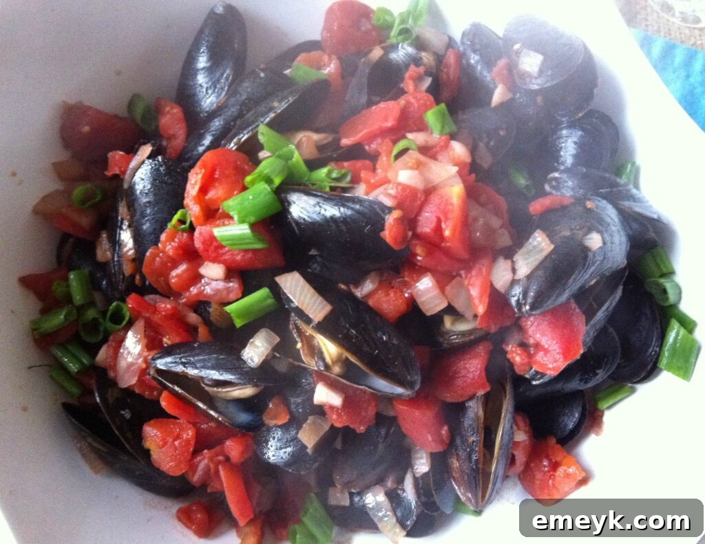Ingredients laid out for Mussels with Smoked Spanish Paprika preparation