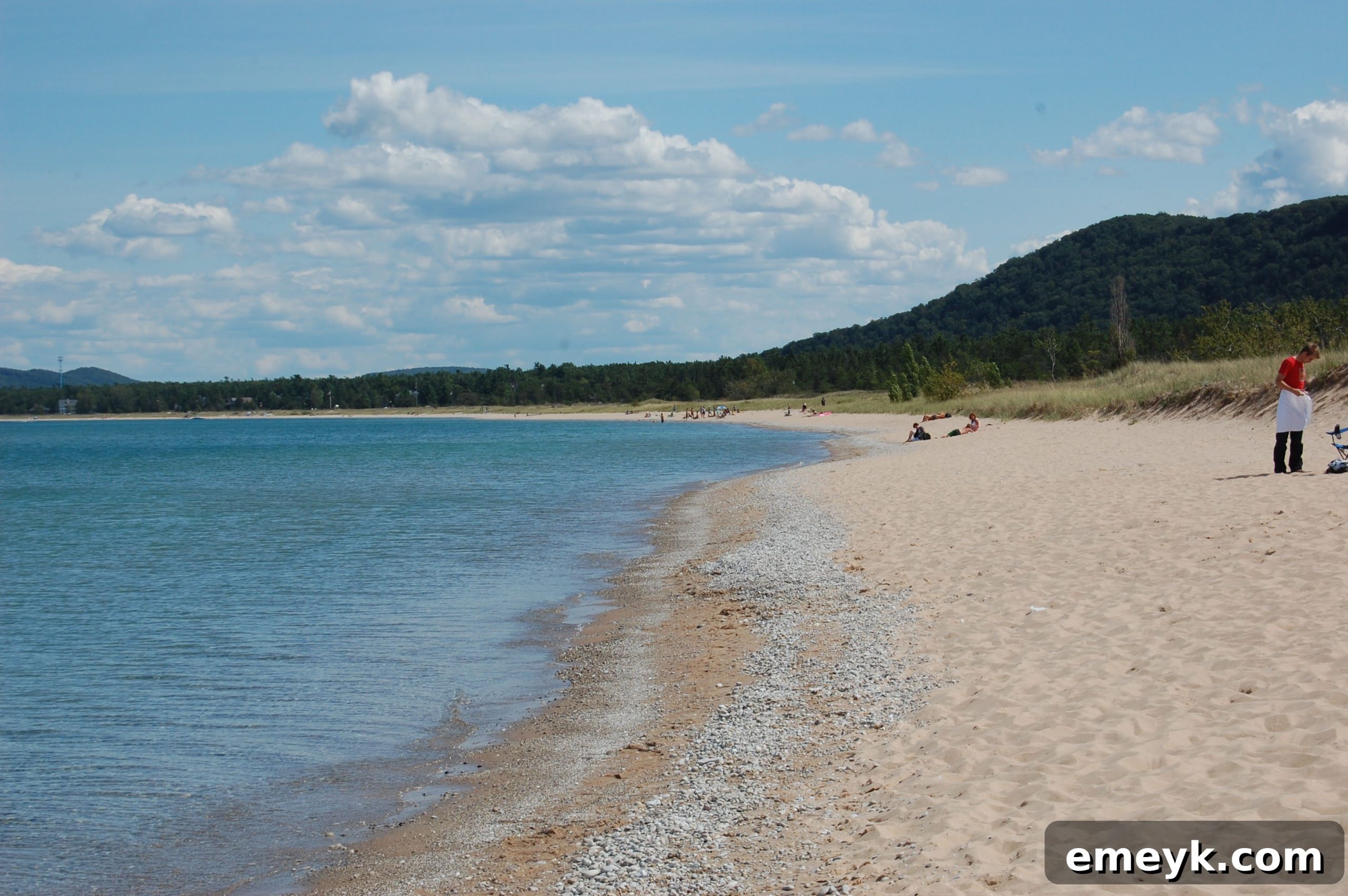 Sleeping Bear Dunes Beach Crystal clear blue waters of Sleeping Bear Dunes beach, inviting and serene.