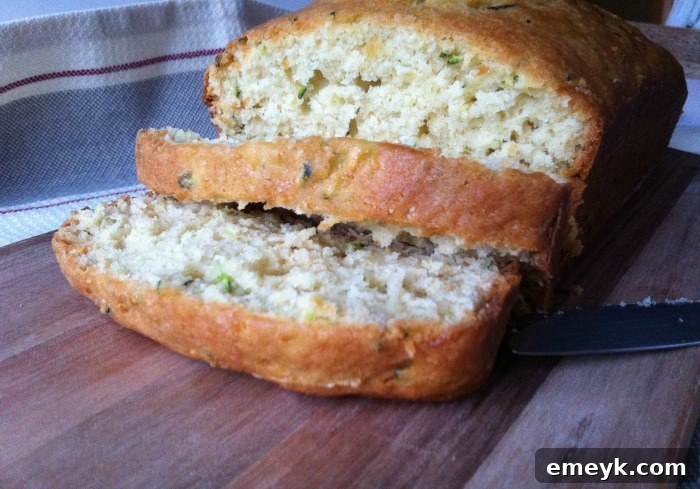 Freshly baked Pineapple Zucchini Bread with a cup of coffee