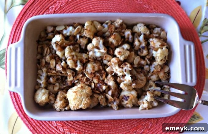 Close-up of perfectly roasted cauliflower florets with a crispy almond panko crust.