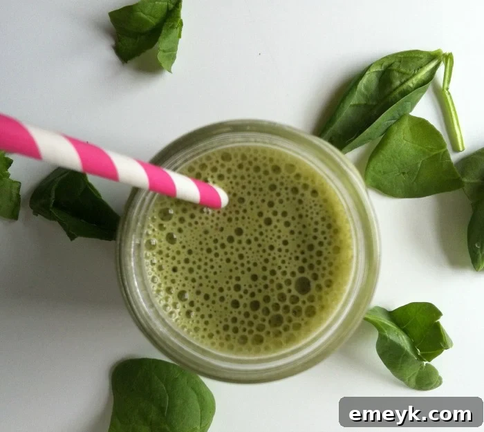 Delicious and healthy Green Smoothie in a glass, ready to drink
