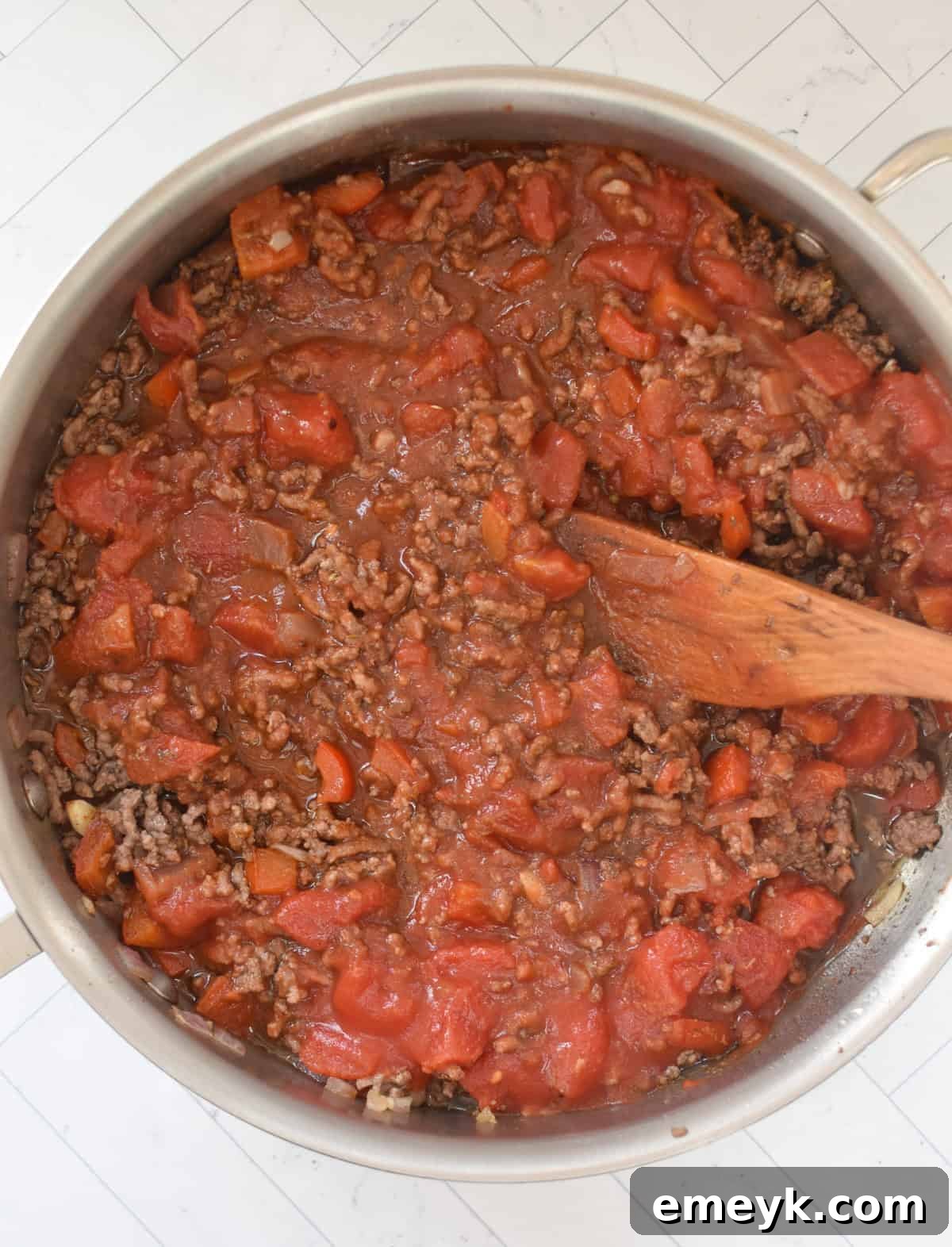 Zesty Mediterranean Beef and Cabbage Sauté 9 Mediterranean Beef and Cabbage Stir-fry with sauce in a skillet