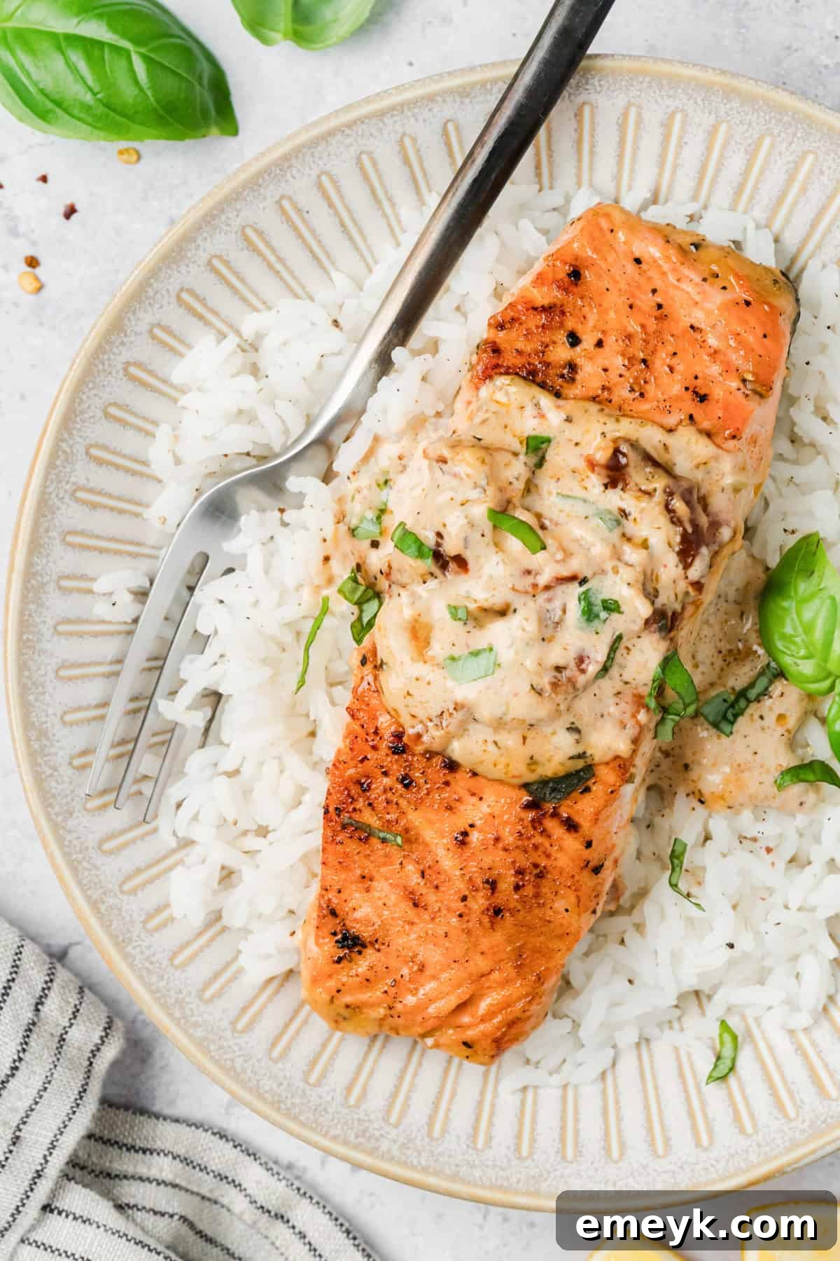 Marry Me Salmon Recipe on a plate with a fork 