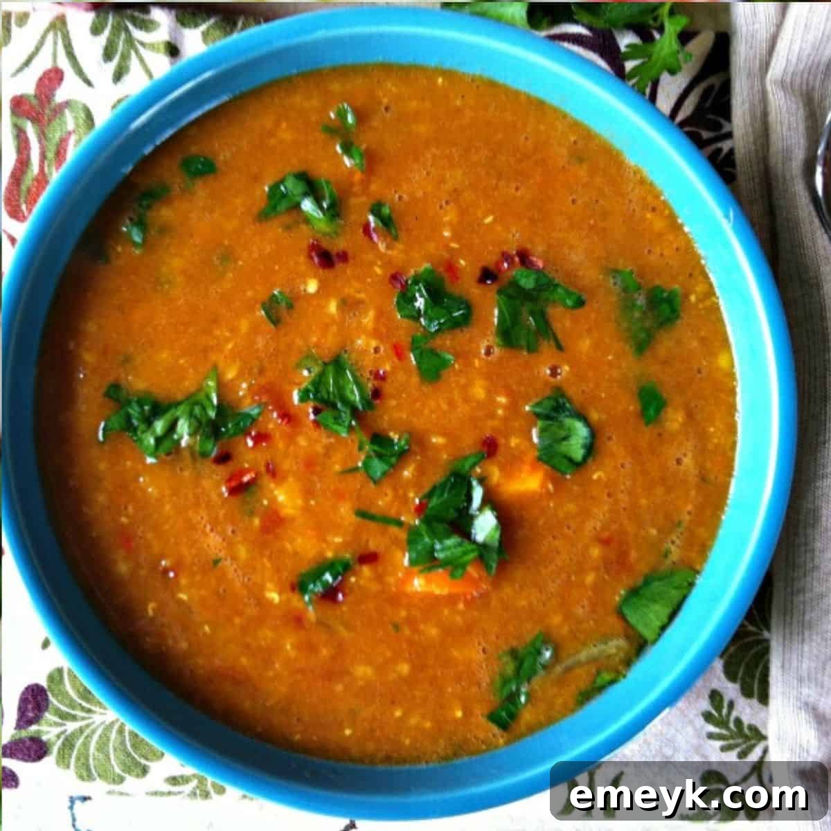Warm Moroccan Red Lentil Soup with fresh herbs.