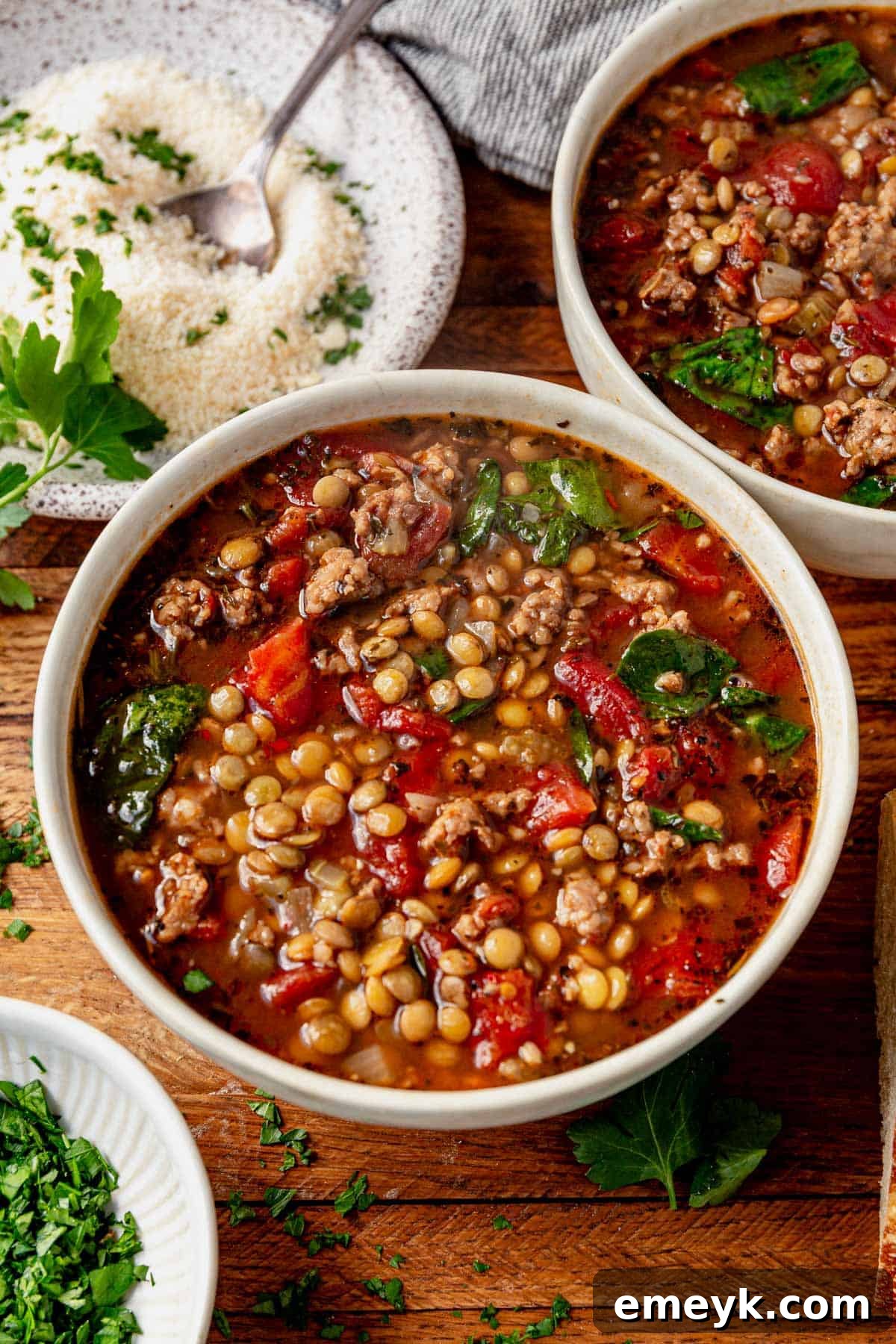 Hearty Lentil Soup with Italian Sausage, served hot.