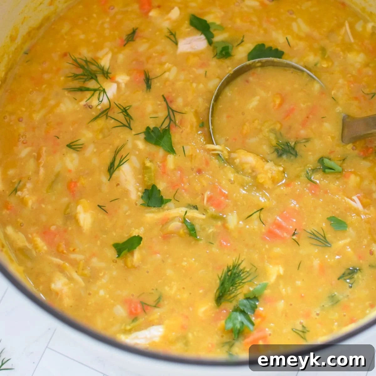 Hearty Chicken Lentil Soup, served in a rustic bowl.