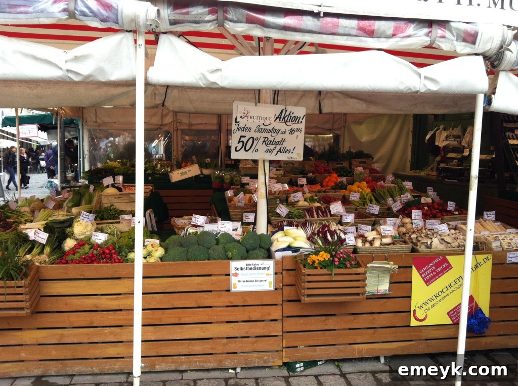 Abundant fruit market stall at Viktualienmarkt, Munich, showcasing fresh produce