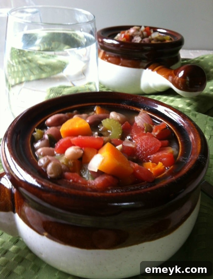Close-up shot of the rich and inviting texture of homemade 15 bean soup in a bowl.