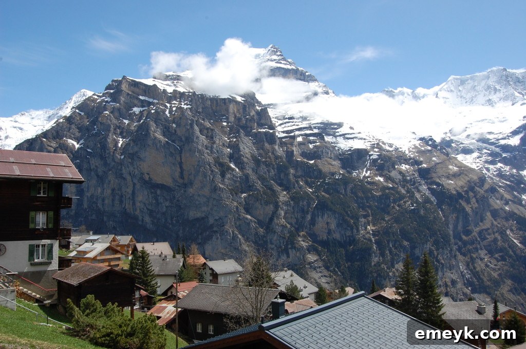 Charming village of Mürren with traditional Swiss chalets and stunning mountain backdrop