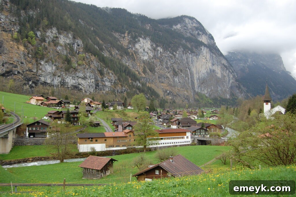 A charming village scene in Lauterbrunnen, Interlaken, Switzerland, surrounded by lush mountains
