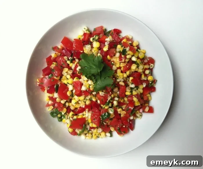 Vibrant bowl of Grilled Corn Salsa with fresh ingredients