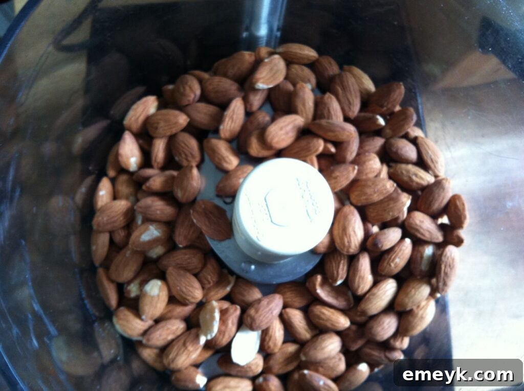 Two cups of whole almonds measured out, ready for processing