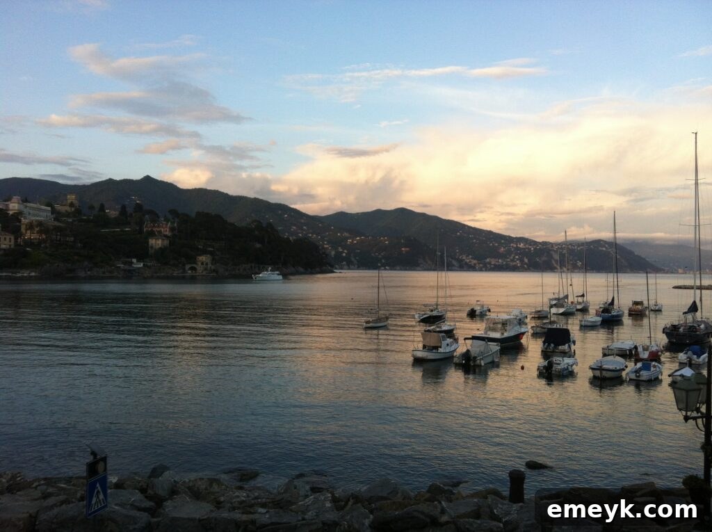 A picturesque harbor in Santa Margherita Ligure with boats docked and colorful buildings in the background