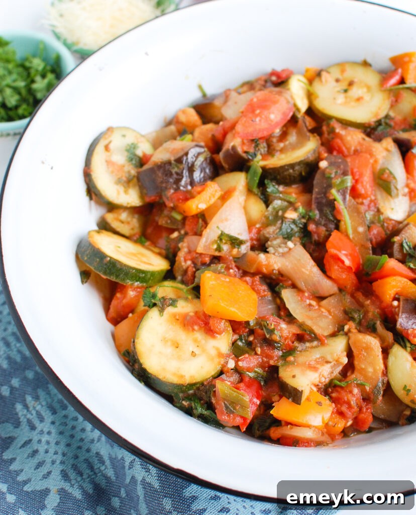 A side view of the Ratatouille dish, highlighting the layers of cooked vegetables.