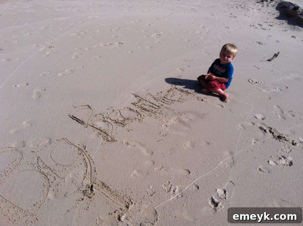 Will at the beach, looking excited to be a big brother