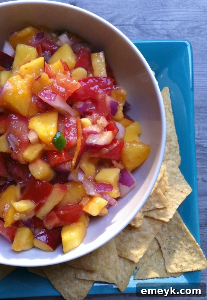 Close-up bowl of colorful Fresh Peach, Mango and Nectarine Salsa