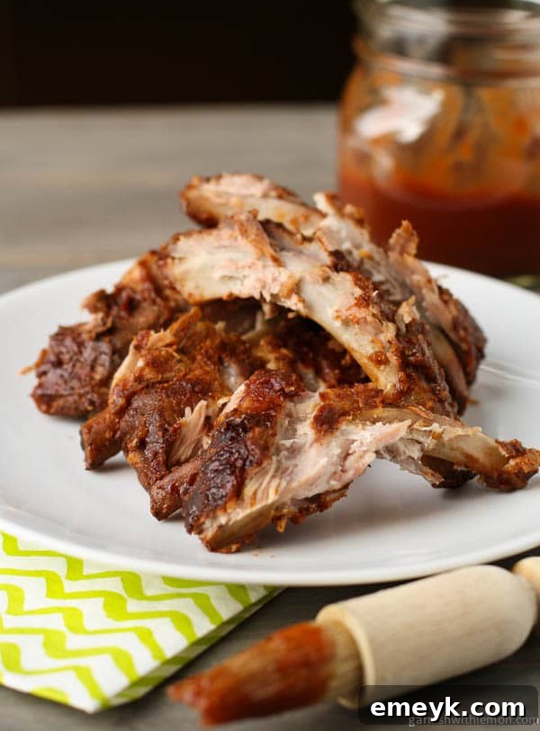35 Stress Free Crockpot Meals for Back to School 4 Tender Crock Pot Ribs, a flavorful main dish from Garnish With Lemon, perfect for an easy back-to-school dinner.