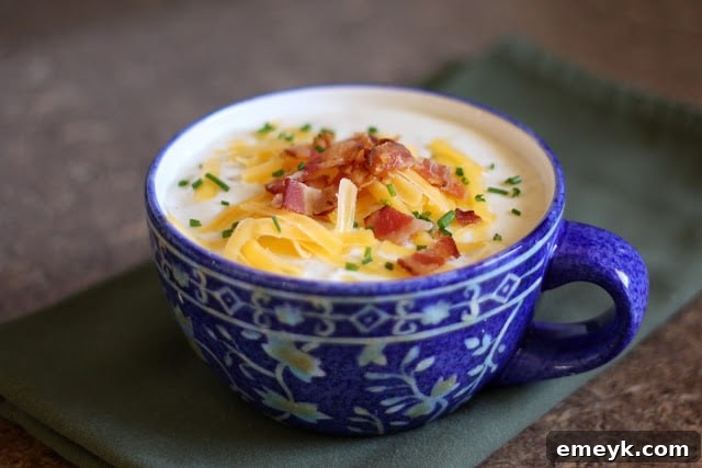 35 Stress Free Crockpot Meals for Back to School 8 Creamy Baked Potato Soup from Barefeet in the Kitchen, a cozy and satisfying crockpot recipe for cold evenings.