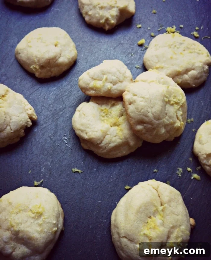 Sweet Lemon Surprise A Baby Shower for Liz 2 Lemon Glazed Cookies recipe, featuring a stack of glazed cookies on a white plate