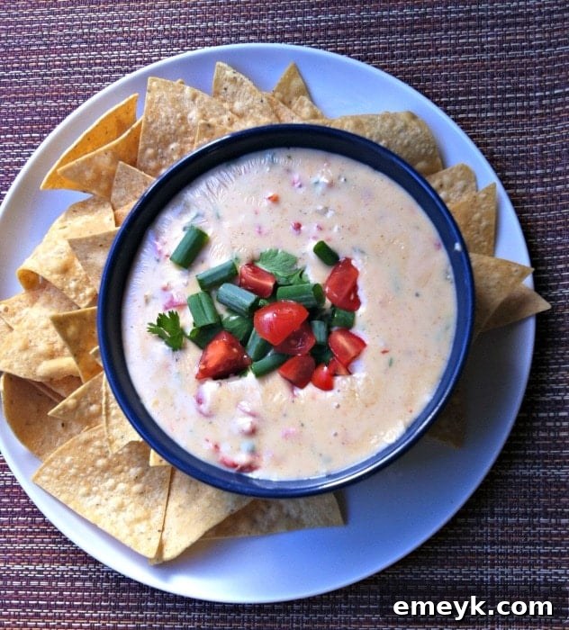 Creamy Queso Blanco Dip, perfect for parties and tailgates.