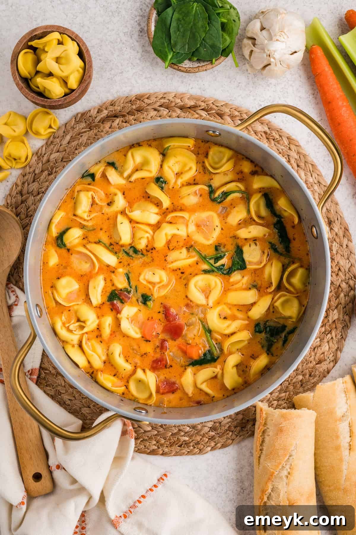 Homemade Creamy Tortellini Soup in a pot 