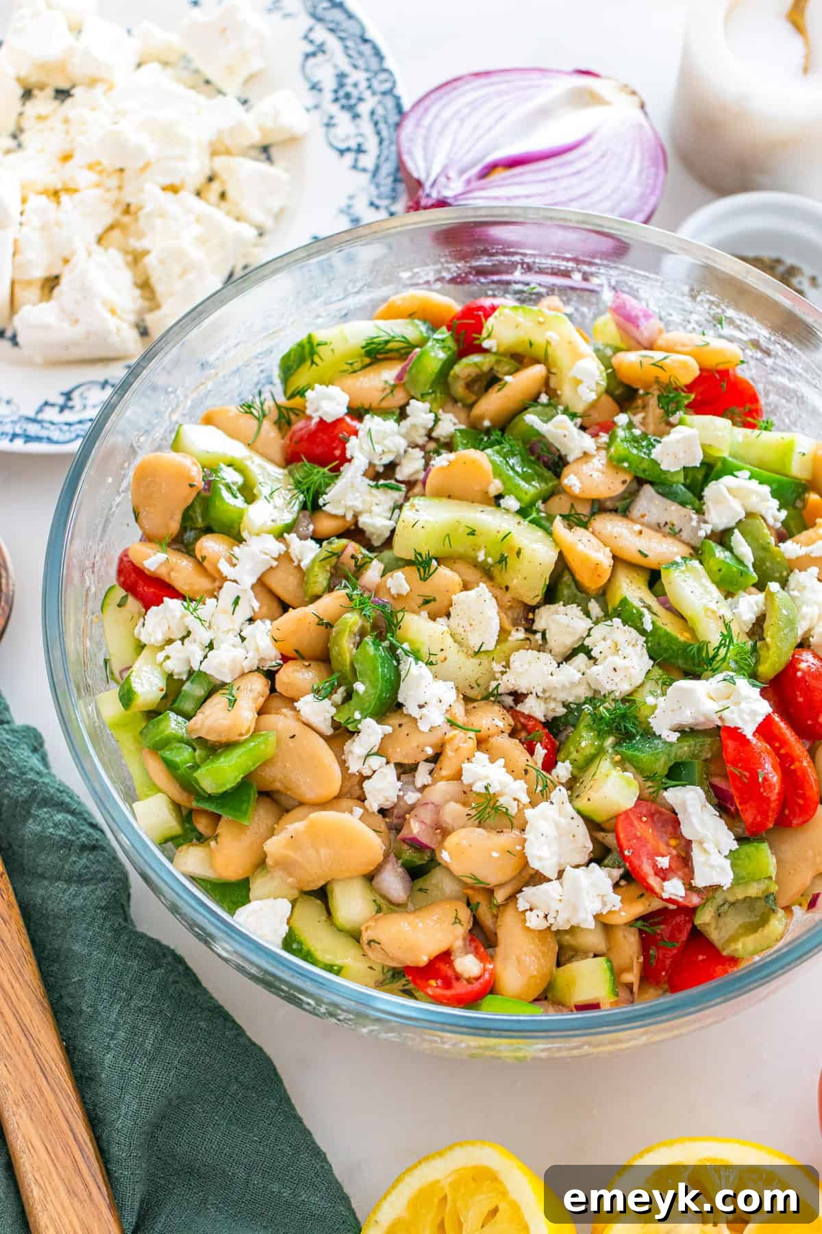Vibrant Mediterranean Butter Bean Salad with feta cheese and fresh herbs, ready to be served.