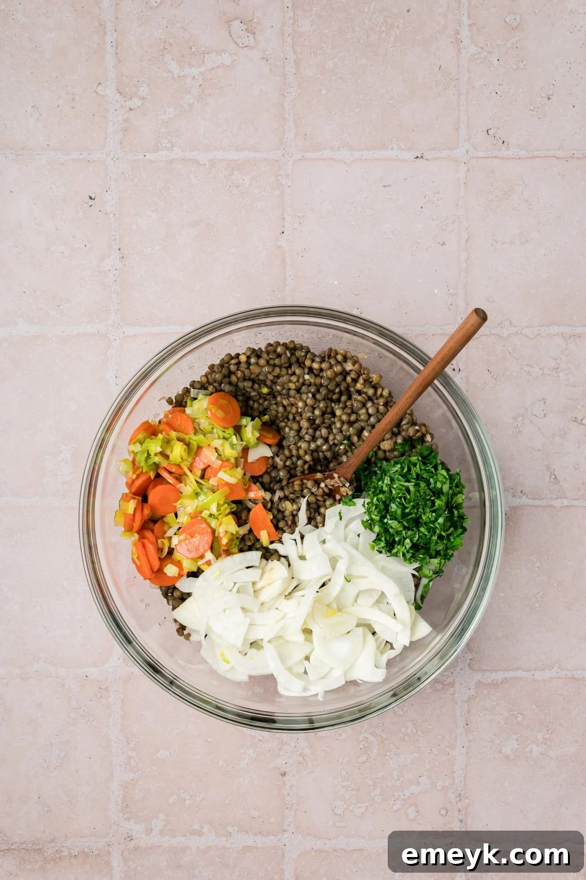 Healthy French Lentil Salad, showcasing the mixed ingredients in a bowl