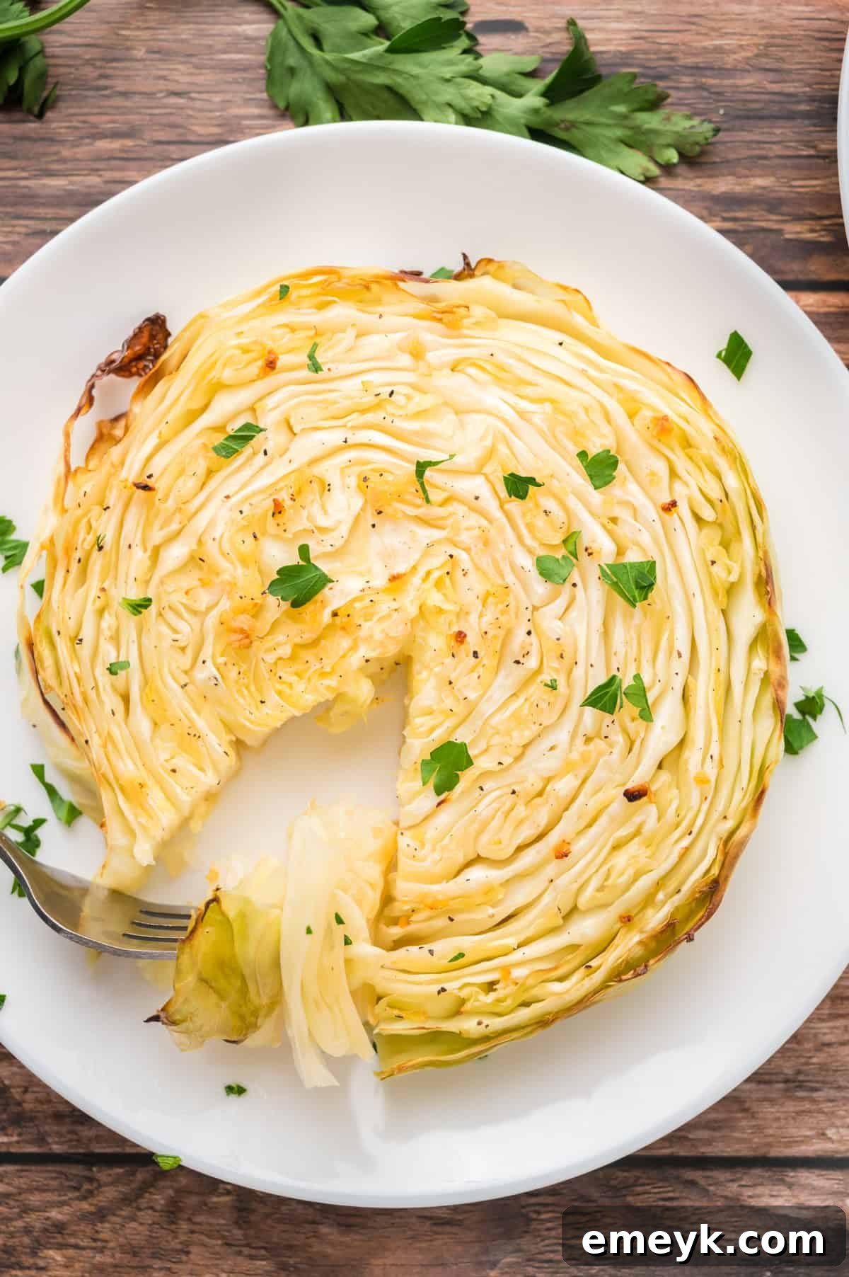 Low Carb Cabbage Steaks served on a simple white plate