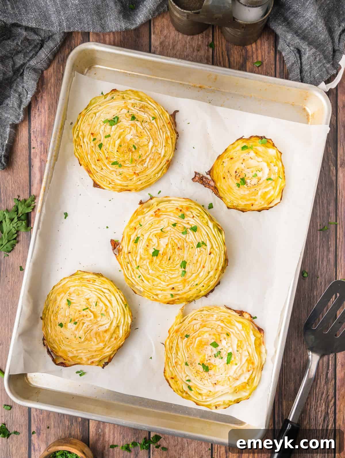 Simple Cabbage Steaks roasted with fresh parsley garnish