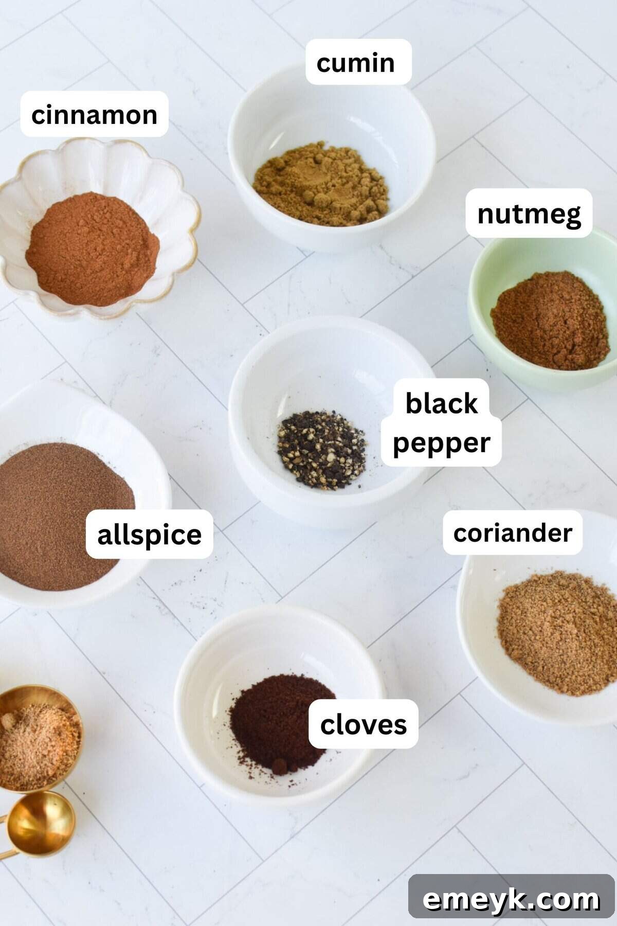 Lebanese 7 Spice Blend with spices in jars 