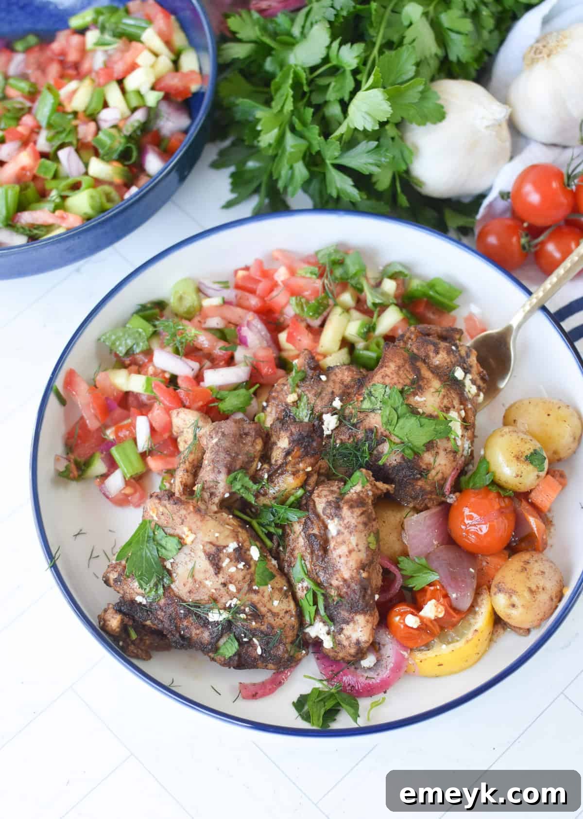 Baked Lebanese baharat chicken with roasted vegetables fresh from the oven