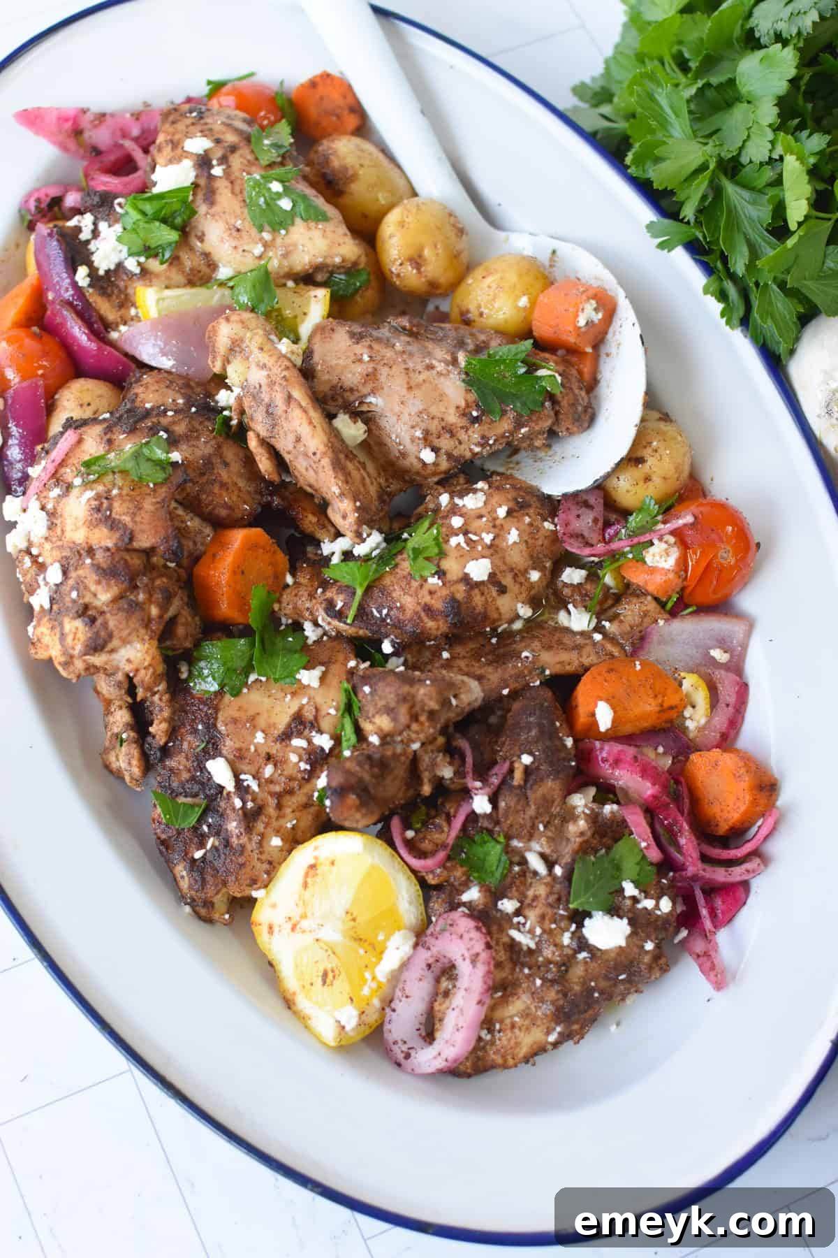 Golden baked Lebanese chicken thighs seasoned with baharat and lemon