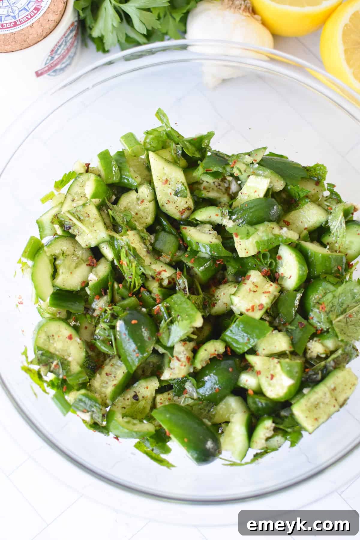 Smashed Cucumber Salad with Sumac, Mint, and Lemon, garnished and ready to serve.