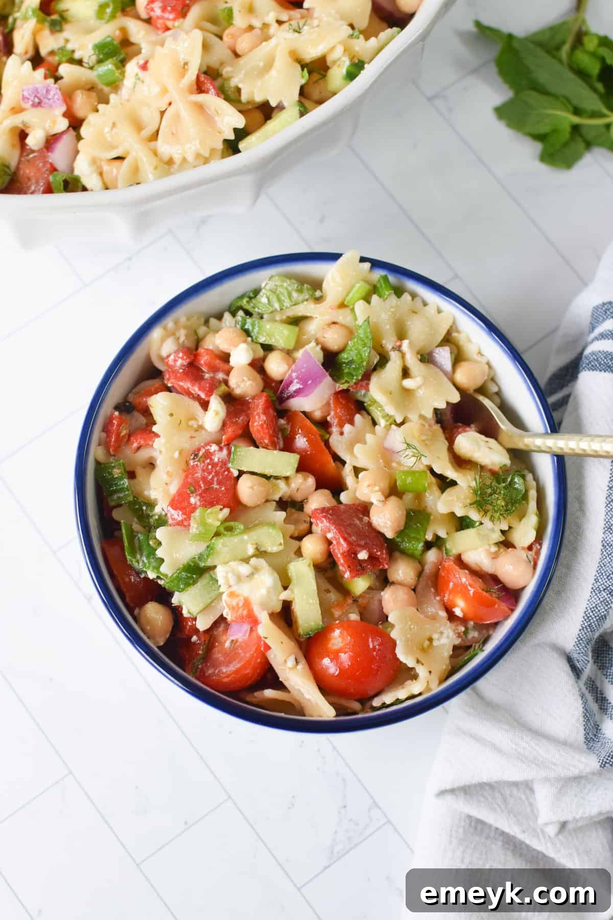 Mediterranean bow tie pasta salad with mint, dill, and lemon olive oil dressing