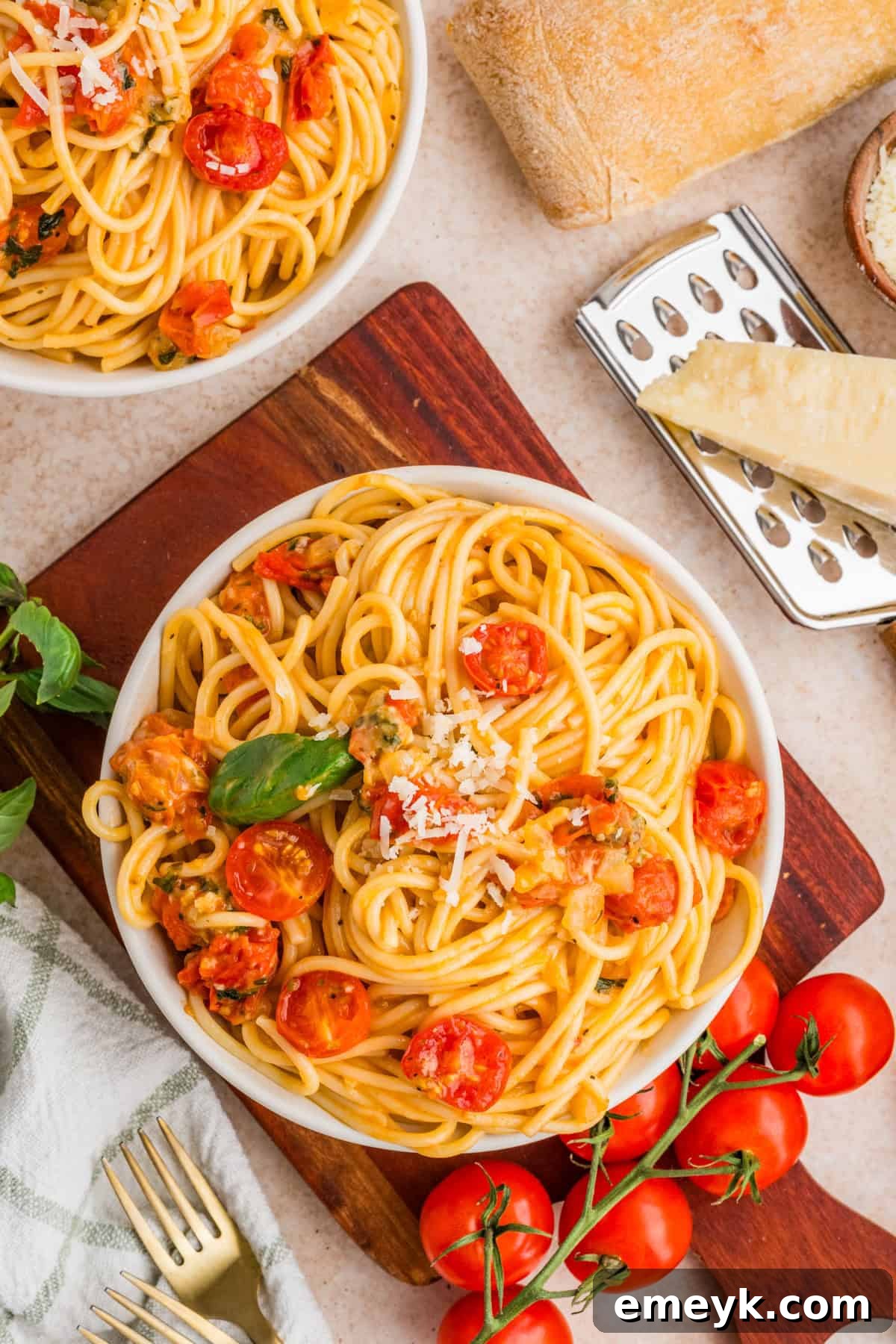 Cherry Tomato Pasta in a bowl with basil garnish 
