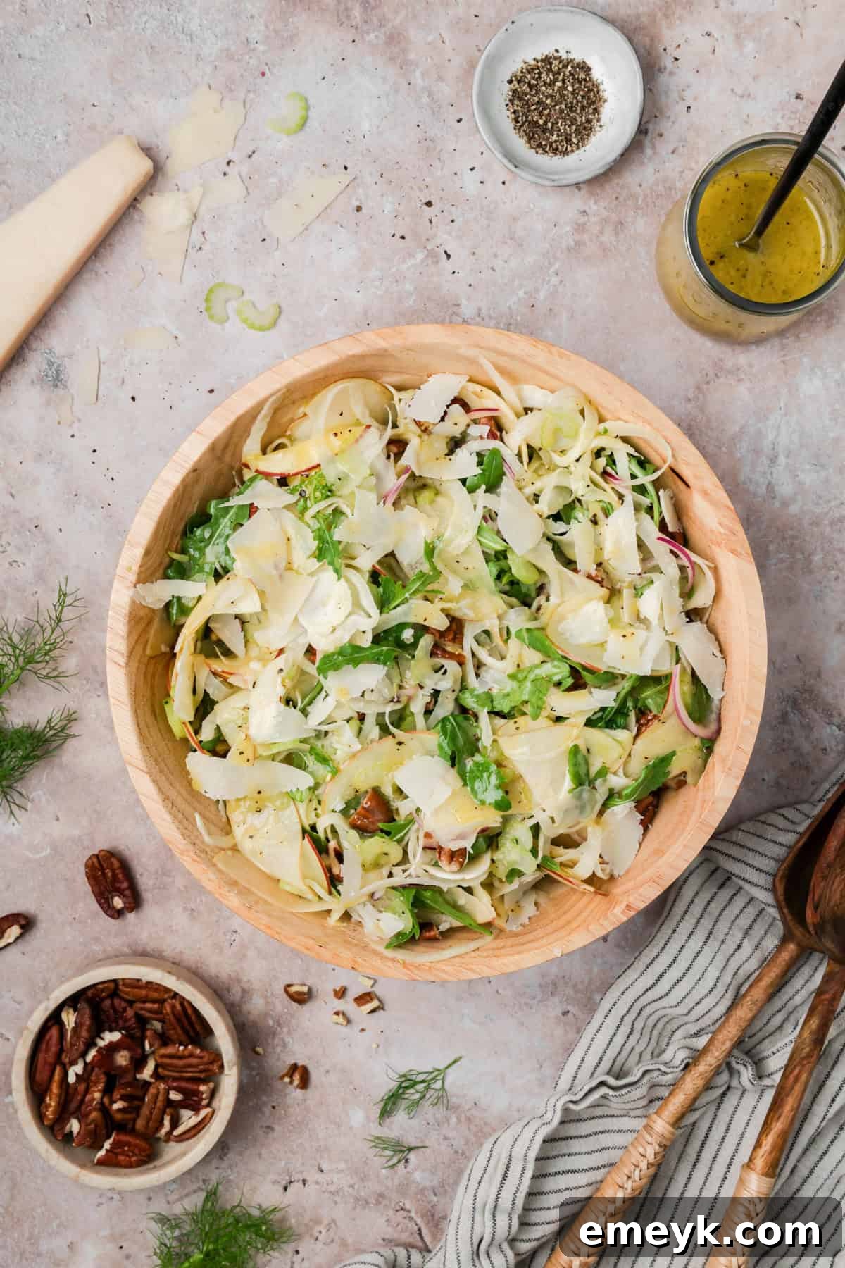 Simple Apple Celery Fennel Salad in a tan bowl 